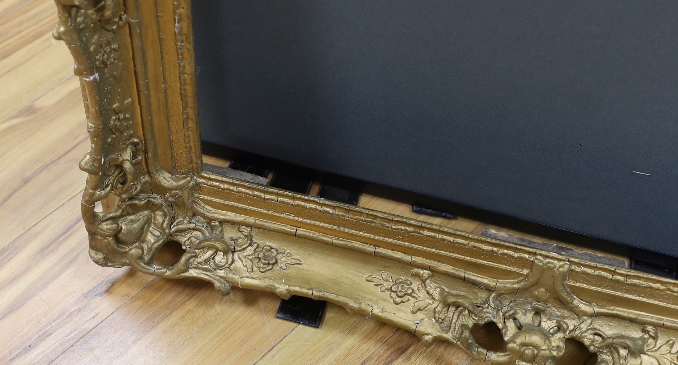 An ornate painted gilt picture frame, 90 x 100cm overall